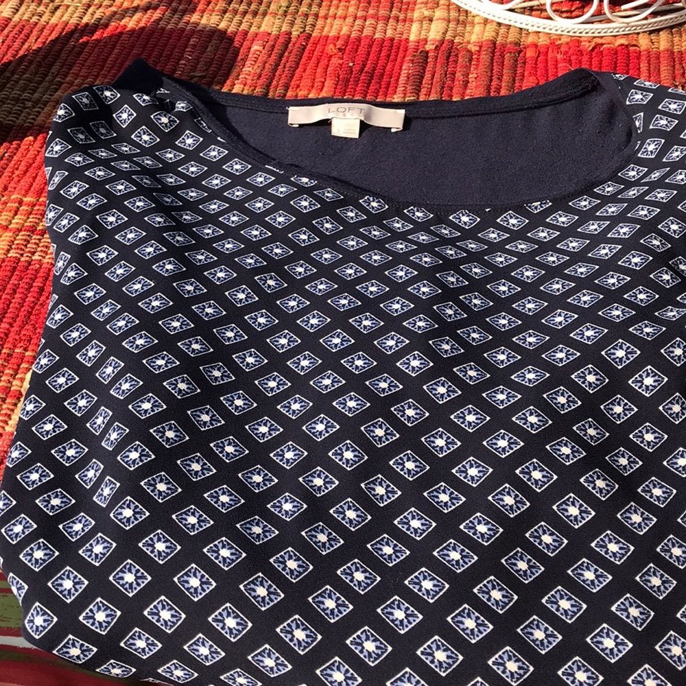 Great top for tan pants,